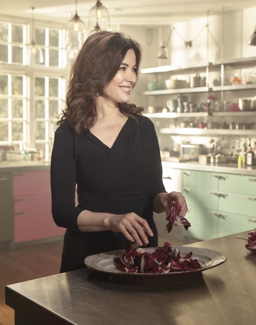 Nigella Lawson's the domestic goddess for a reason. Her 12th cookbook AT MY TABLE is a must-have.