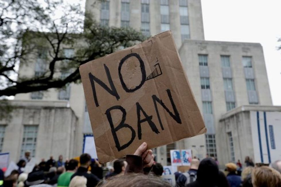 no ban protest sign