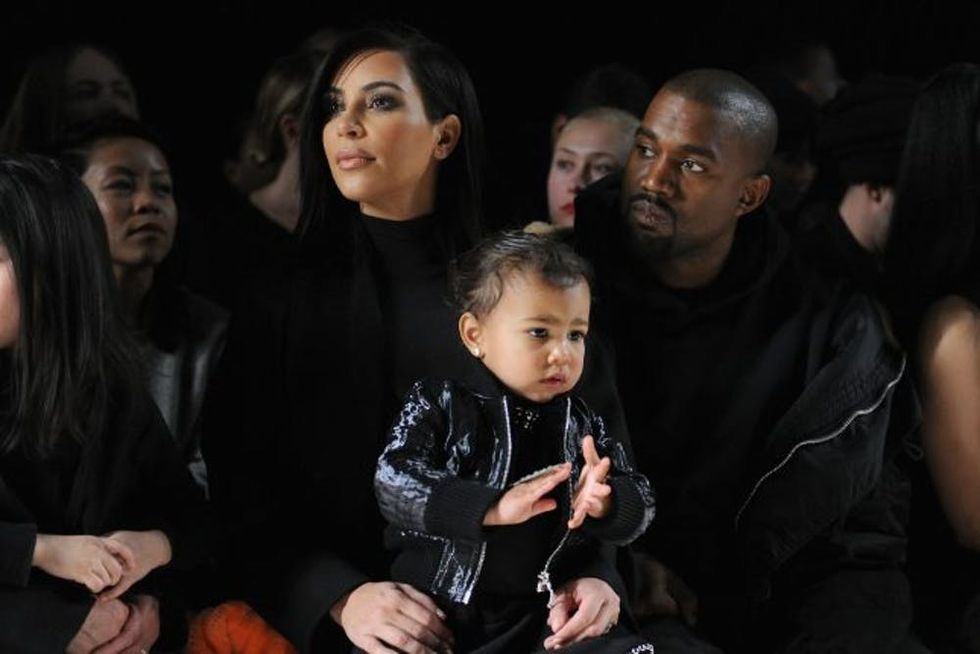 North West fashion show front row with Kim and Kanye