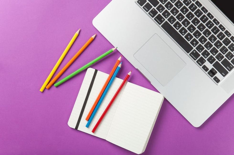 Note-with-laptop-and-pencils-000064098049_Medium