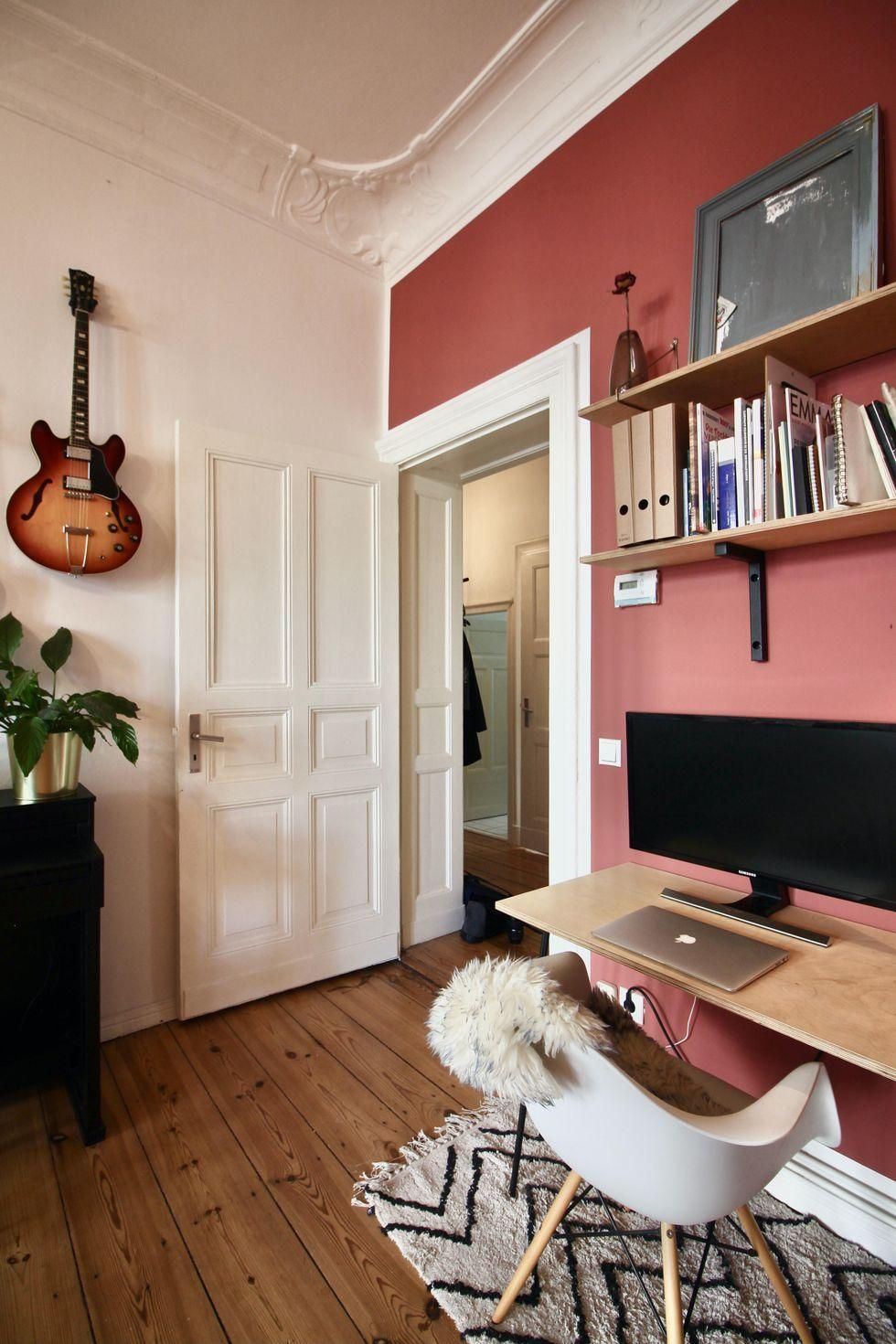 office space with red walls