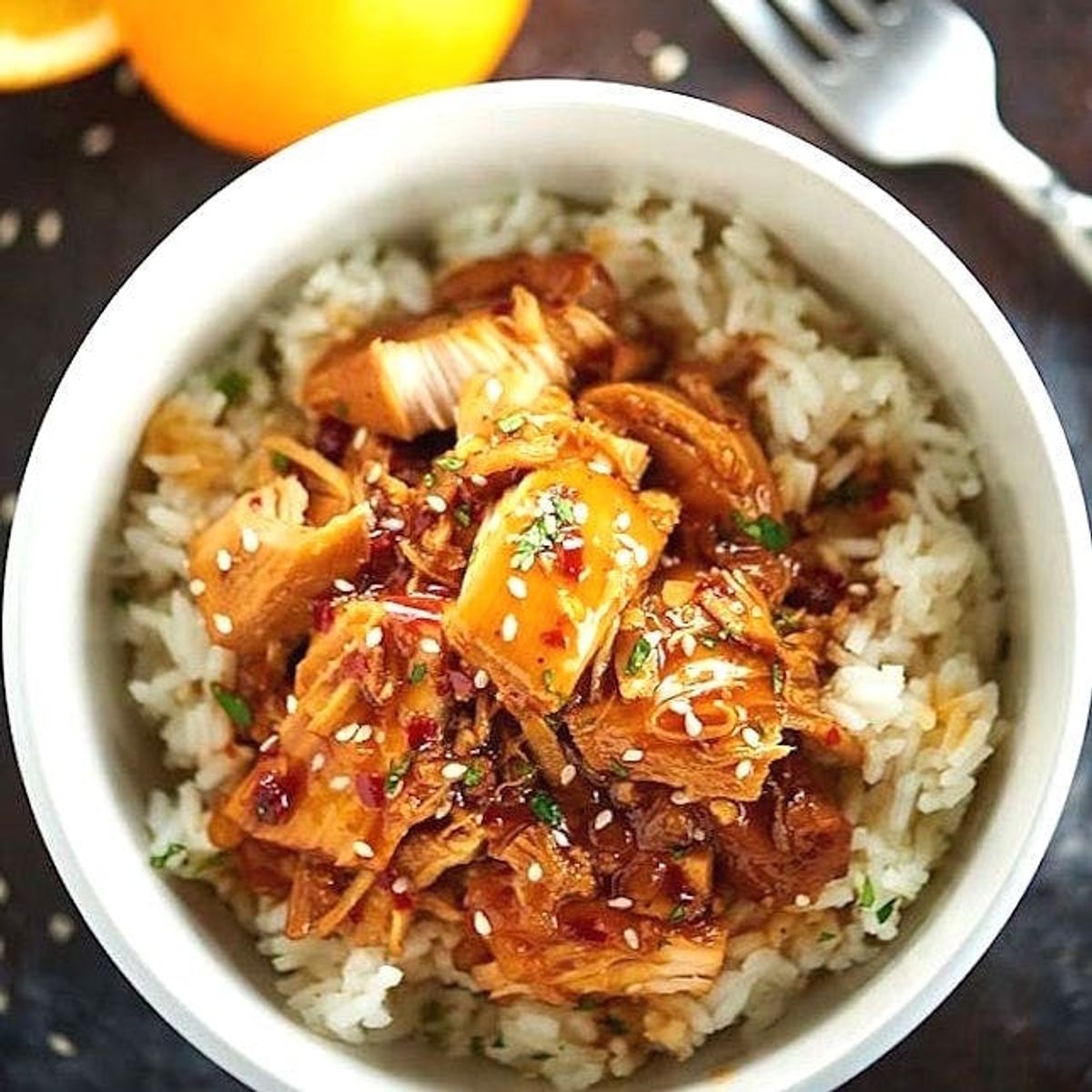 Our 40 healthy crockpot recipes include this slow cooked orange chicken over rice
