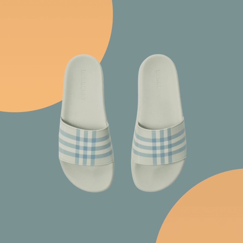 Pale blue plaid slides on a gray and orange background.