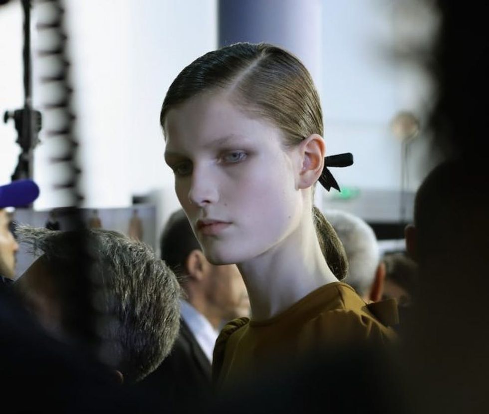 PARIS, FRANCE - MARCH 01: (EDITORS NOTE: Image has been desaturated.) A model prepares backstage before the Rochas show as part of the Paris Fashion Week Womenswear Fall/Winter 2017/2018 on March 1, 2017 in Paris, France. (Photo by Vittorio Zunino Celotto/Getty Images)