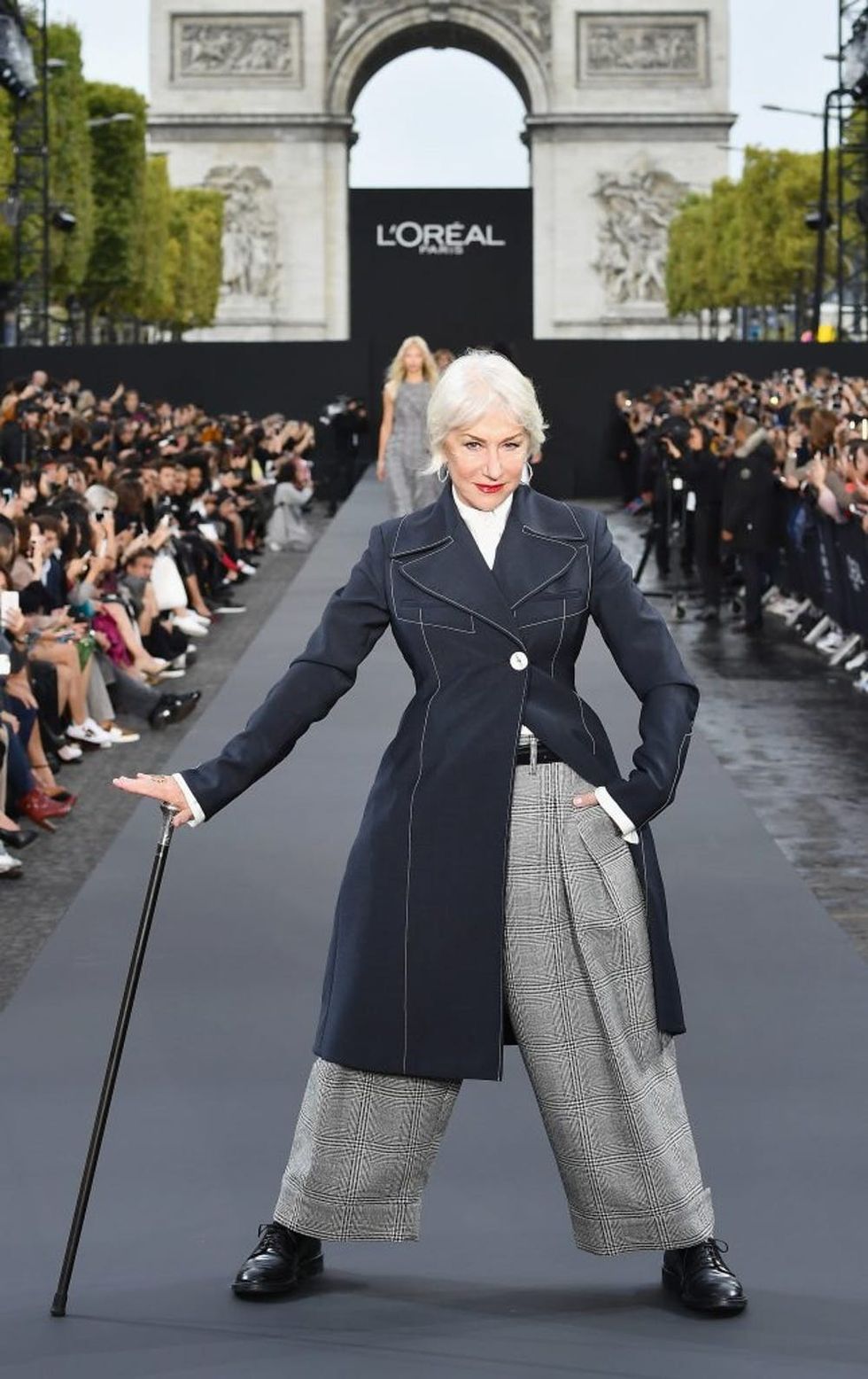 PARIS, FRANCE - OCTOBER 01: Helen Mirren walks the runway during Le Defile L'Oreal Paris as part of Paris Fashion Week Womenswear Spring/Summer 2018 at Avenue Des Champs Elysees on October 1, 2017 in Paris, France. (Photo by Pascal Le Segretain/Getty Images for L'Oreal Paris)