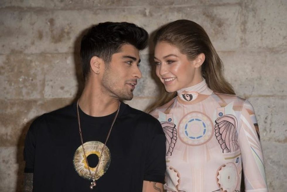 PARIS, FRANCE - OCTOBER 02: Zayn Malik and Gigi Hadid attend the Givenchy show as part of the Paris Fashion Week Womenswear Spring/Summer 2017 on October 2, 2016 in Paris, France. (Photo by Dominique Charriau/WireImage)