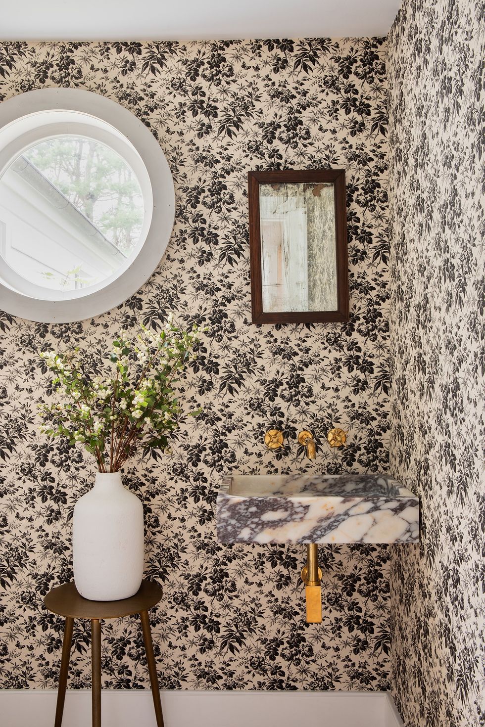pattern blending wallpaper in a half bath