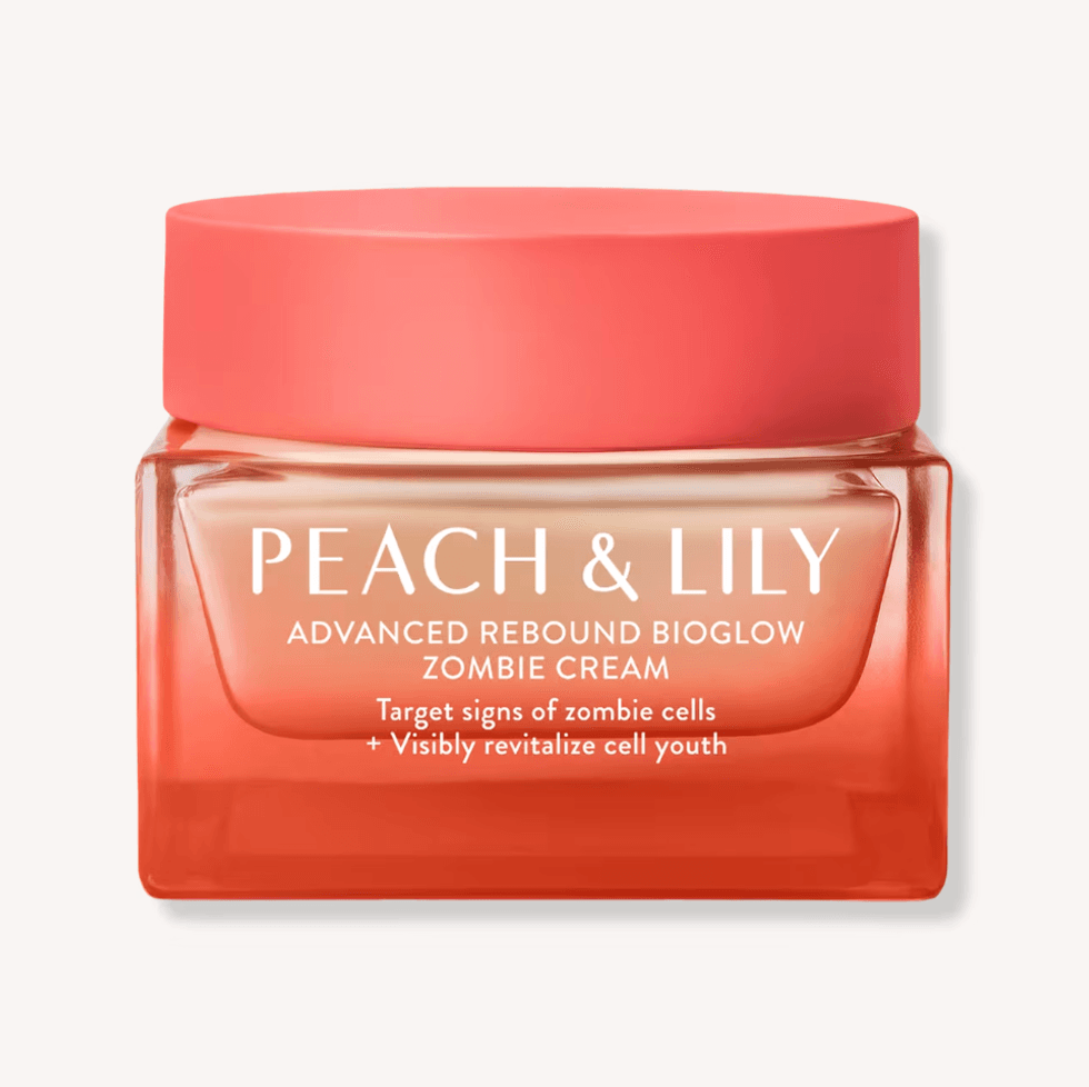 Peach & Lily Bioglow Zombie Cream jar with coral cap and label.