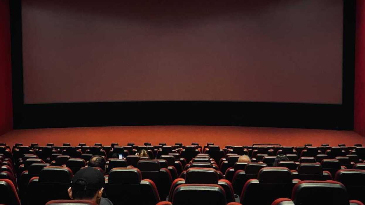 people sitting in a movie theater
