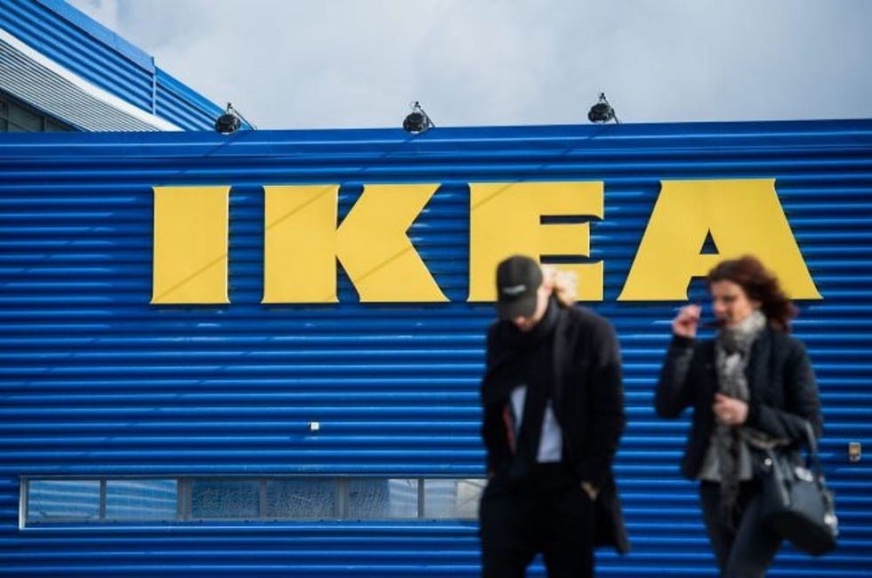 People walk outside Europe's biggest Ikea store is pictured in Kungens Kurva, south-west of Stockholm on March 30, 2016. Ikea founder Ingvar Kamprad, who built a global business empire with revolutionary flat-pack furniture and dallied with Nazism in his youth, turned 90 today. / AFP / JONATHAN NACKSTRAND (Photo credit should read JONATHAN NACKSTRAND/AFP/Getty Images)