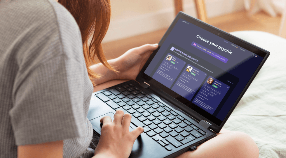 Person browsing psychics on a laptop with a "Choose your psychic" interface.
