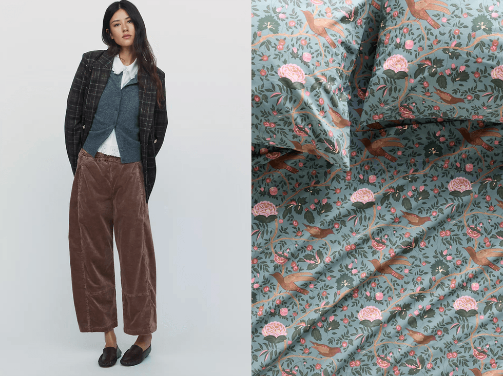 Person in layered outfit; floral patterned bedspread.