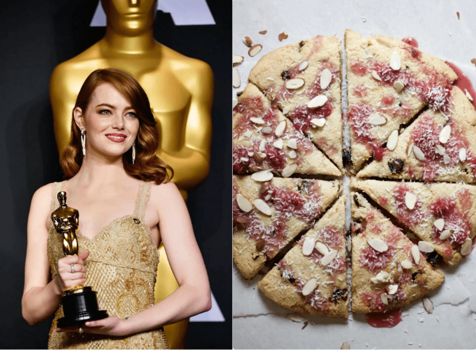 Person with an award; sliced almond and cranberry dessert on the side.