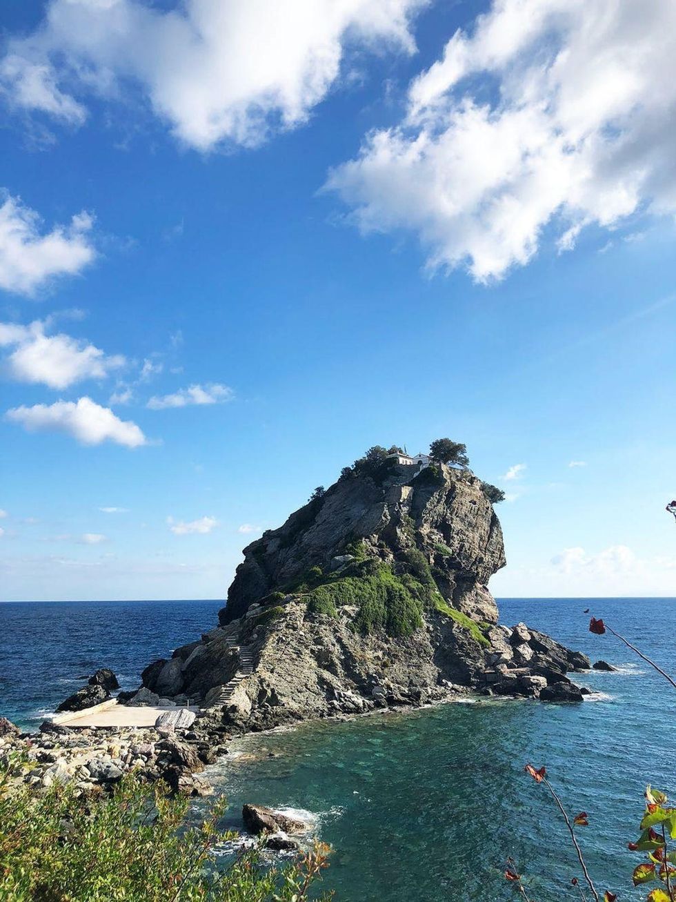 photo of a giant rock in the sea in skopelos