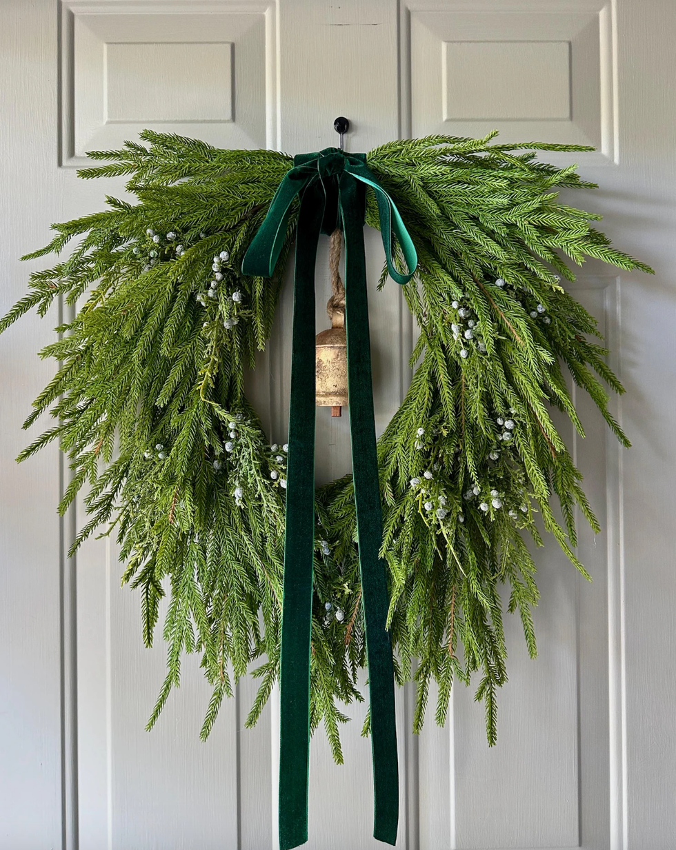 pine wreath with velvet bow