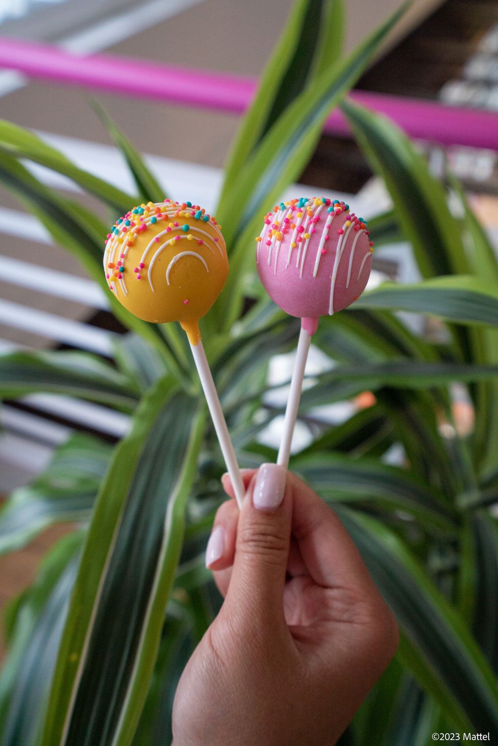 pink and yellow cake pops