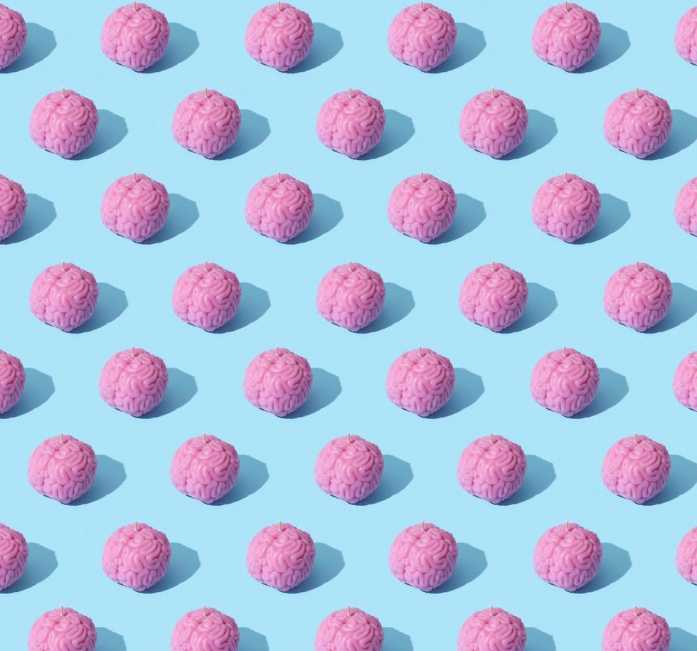 pink brains against a bright blue background
