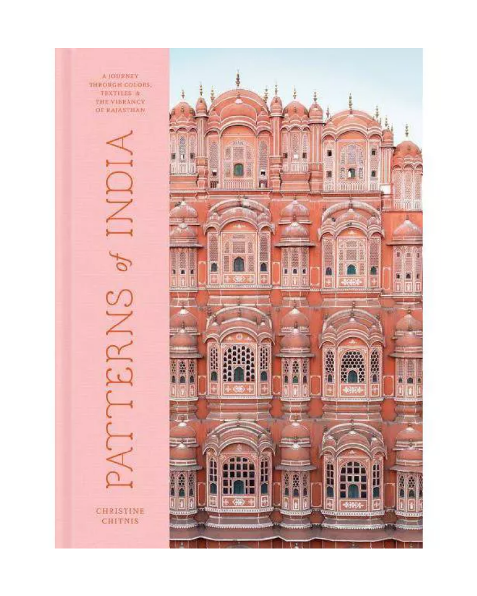 pink coffee table book with building in india on the front