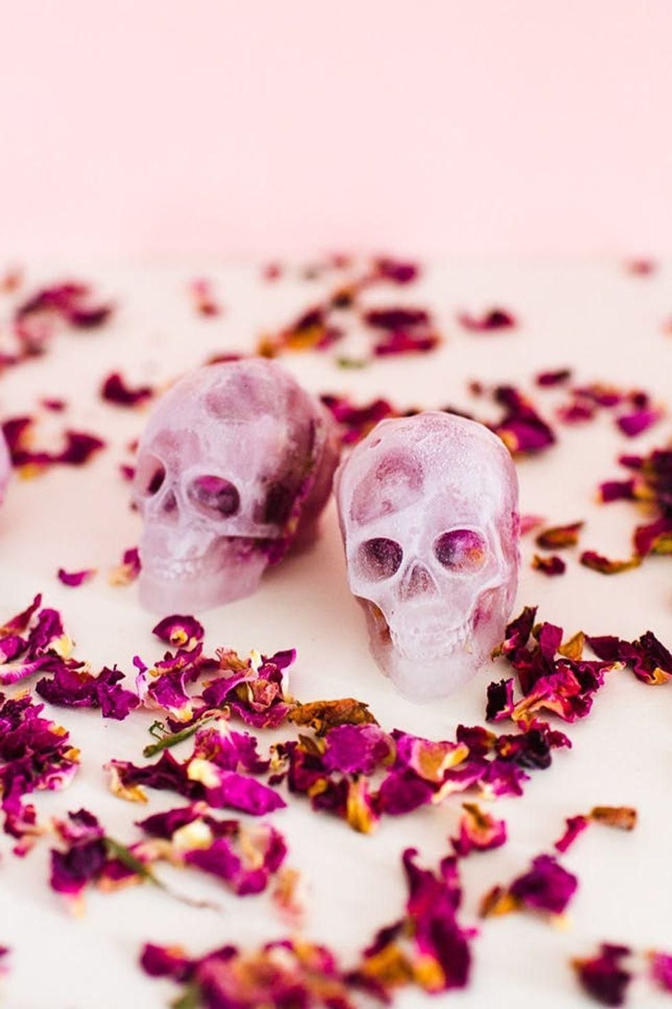 pink DIY Skull Ice Cubes surrounded by dried roses