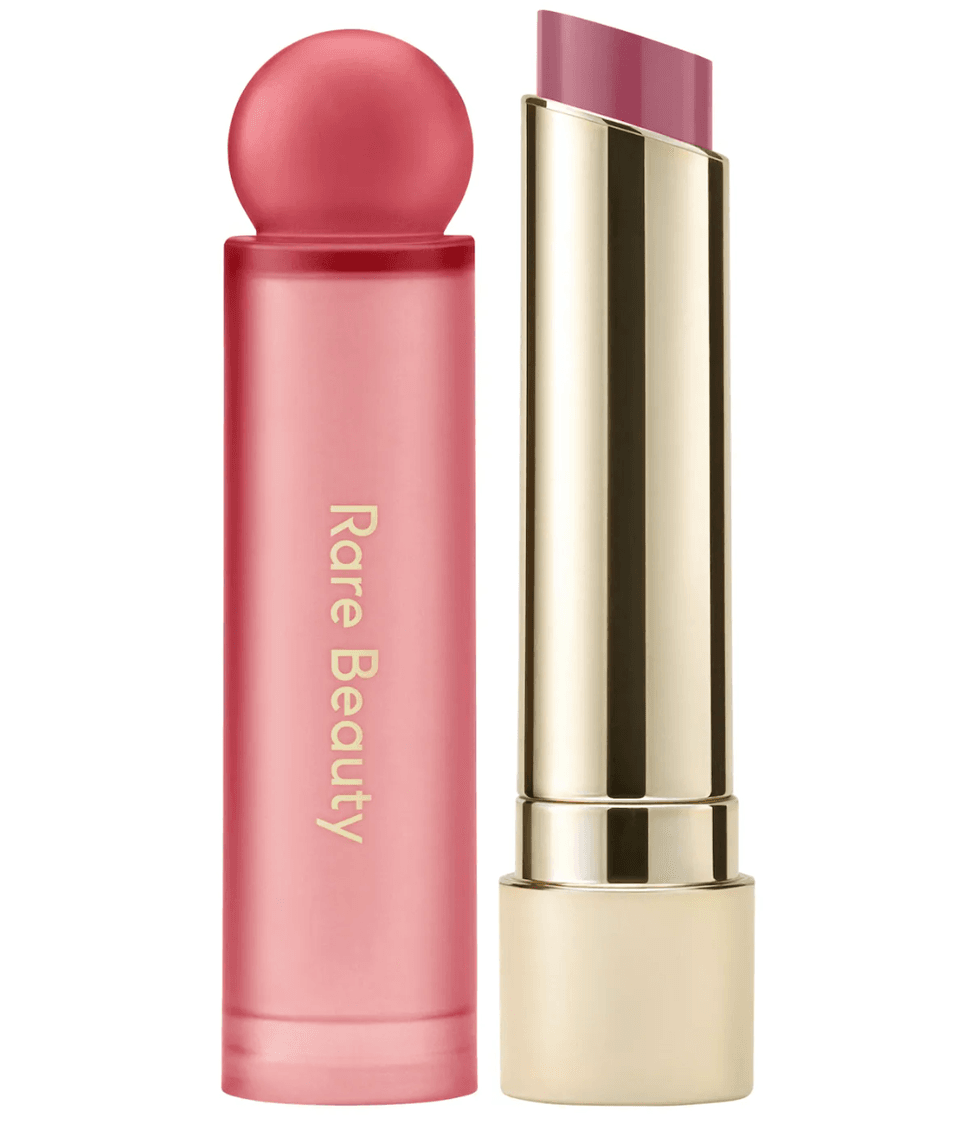 Pink lipstick and red-capped tube labeled "Rare Beauty."