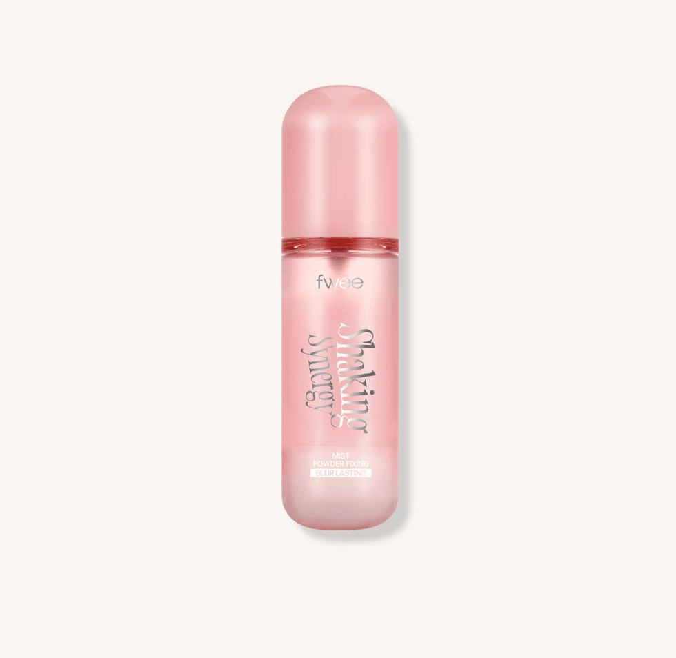 Pink "Shaking Synergy" mist bottle with rounded cap on a white background.