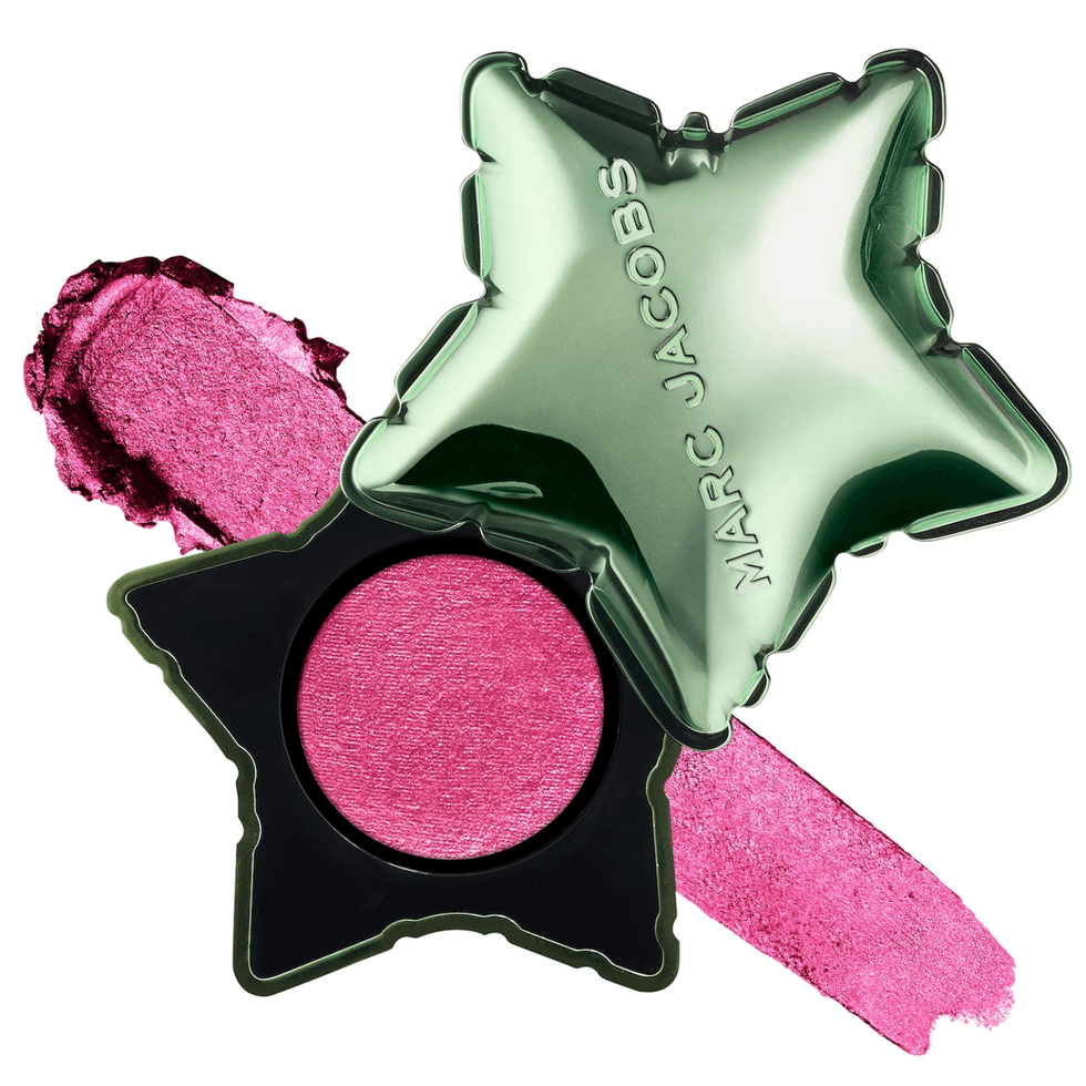 Pink star-shaped eyeshadow with green lid, Marc Jacobs branding.