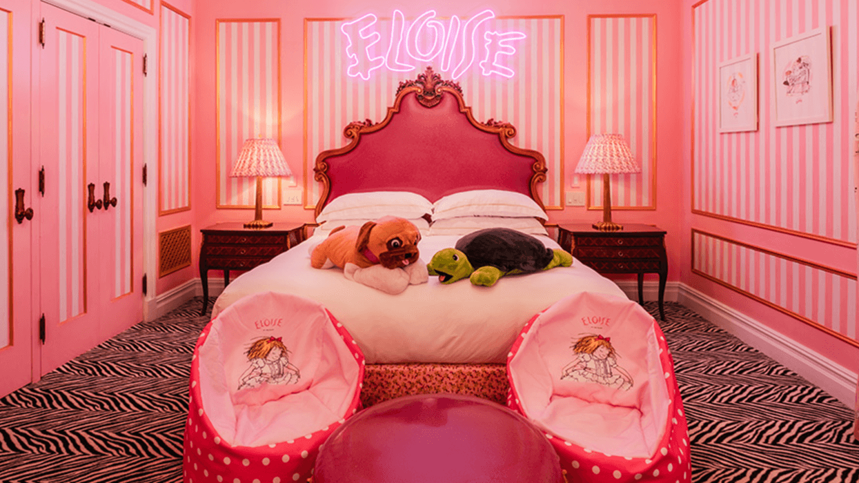 Pink-themed room with bed, plush toys, zebra carpet, and "ELOISE" neon sign.