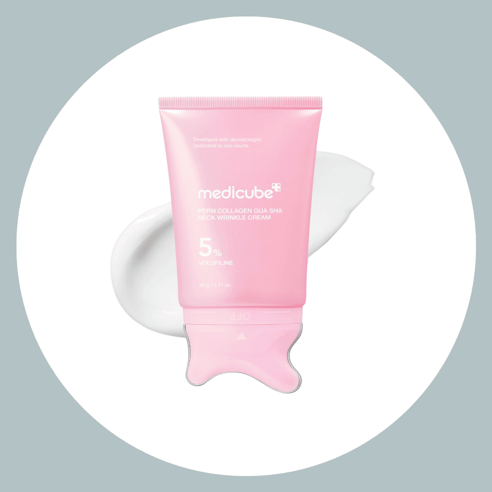 Pink tube of Medicube neck wrinkle cream on a white background.