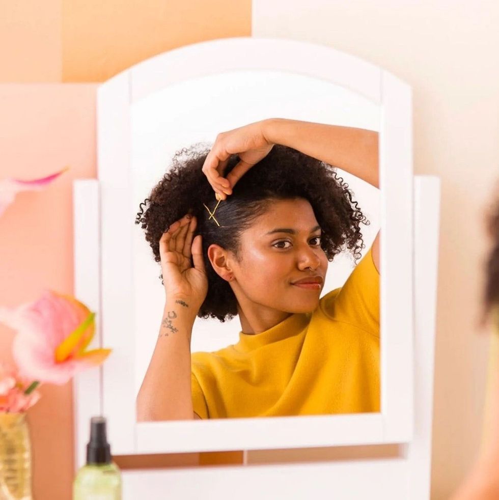 pinned back curly hair