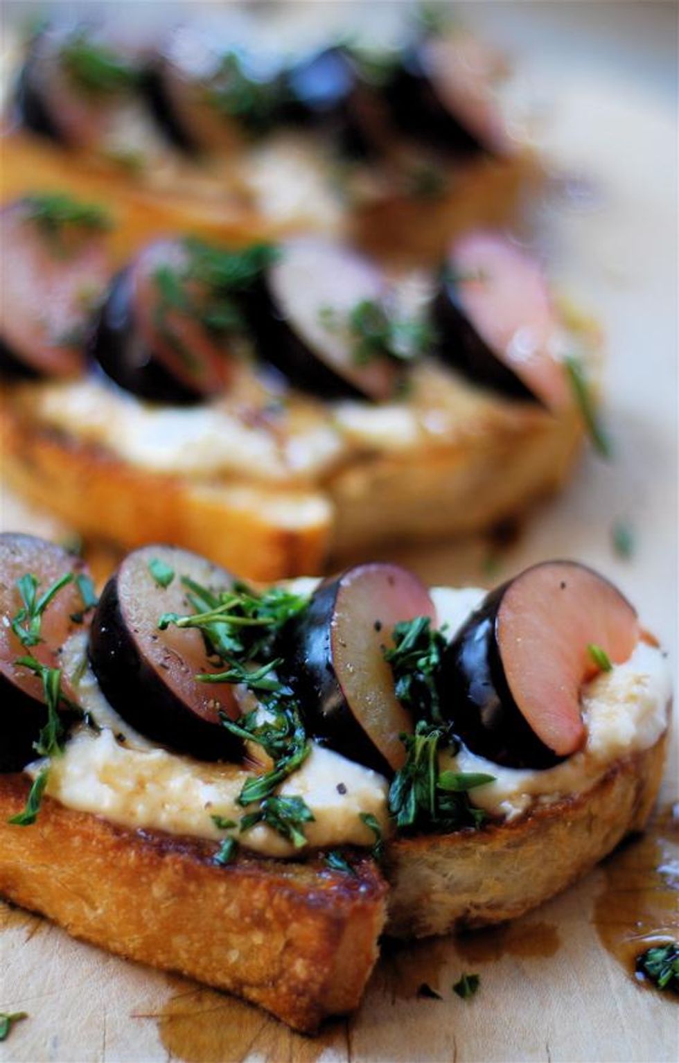 plum crostini with cheese and mint