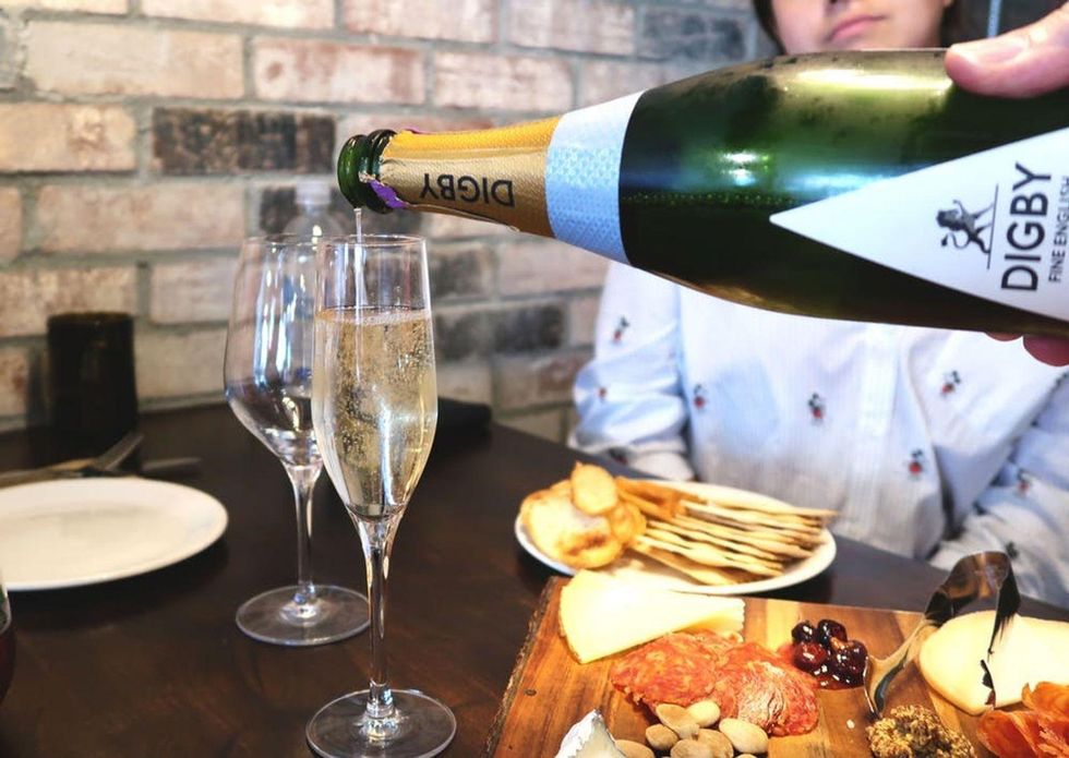 pouring a glass of champagne