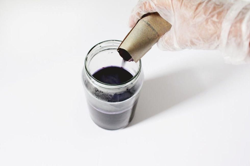 pouring dye into container