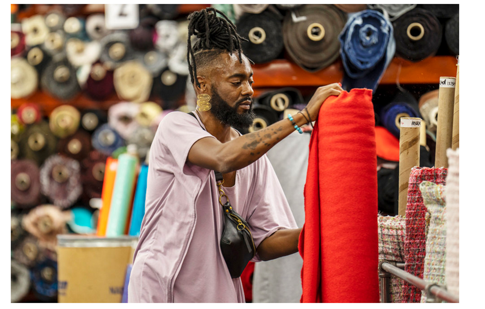 Prajje Oscar Jean-Baptiste gathering fabric