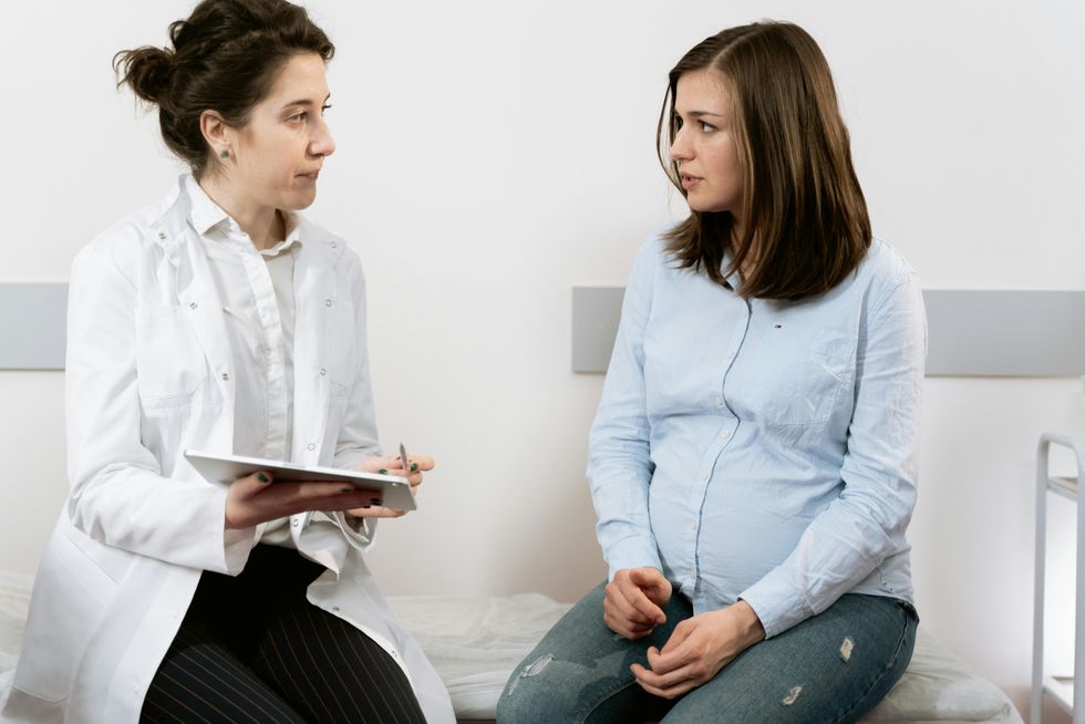 pregnant woman at doctor's appointment