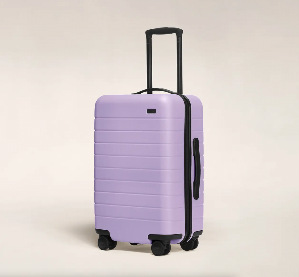 purple carry on suitcase away