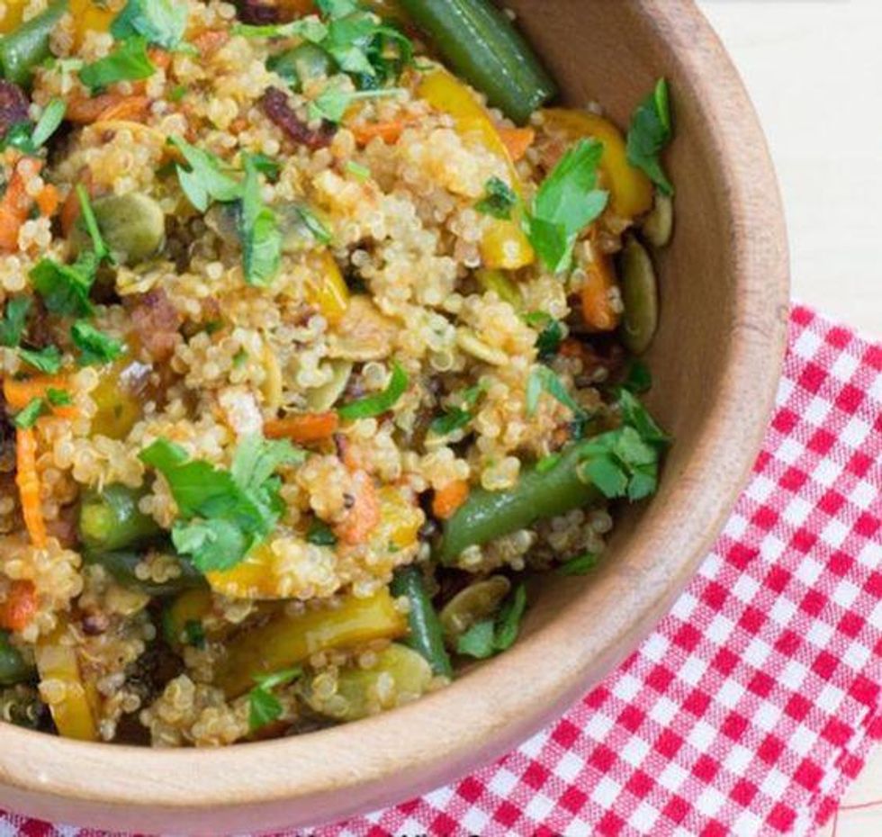 quinoa and vegetable meal on a red and white gingham tablecloth