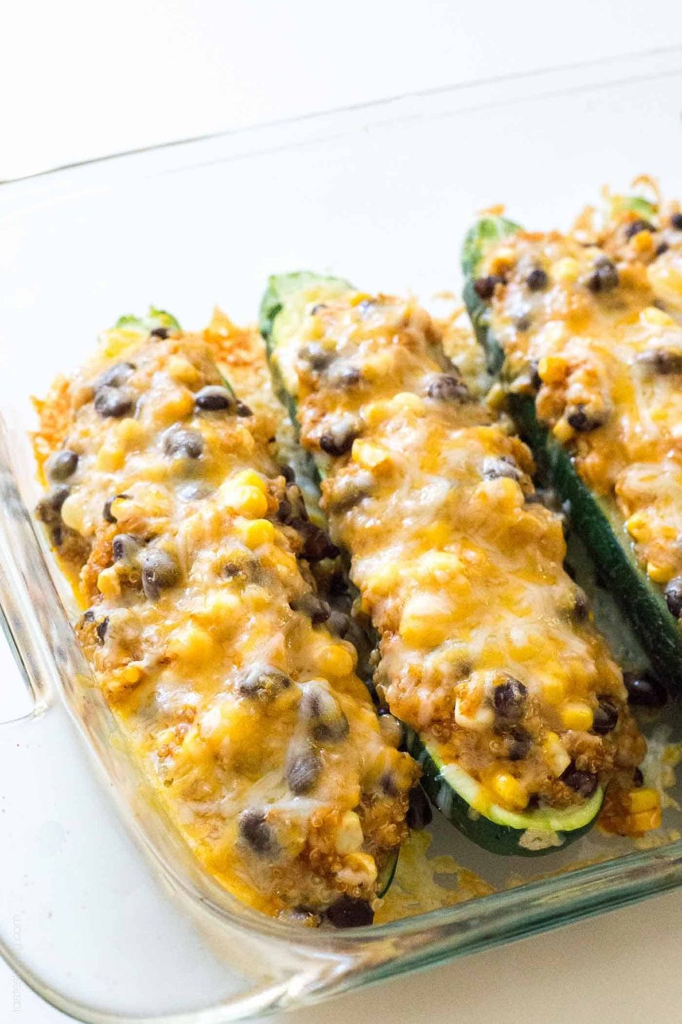 Quinoa & Black Bean Enchilada Stuffed Zucchinis