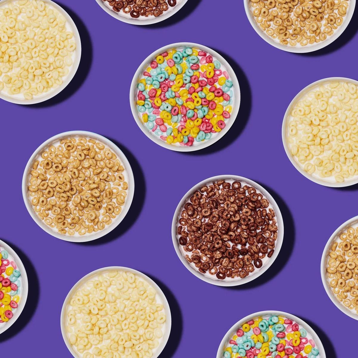 rainbow healthy cereal on a purple background breakfast foods