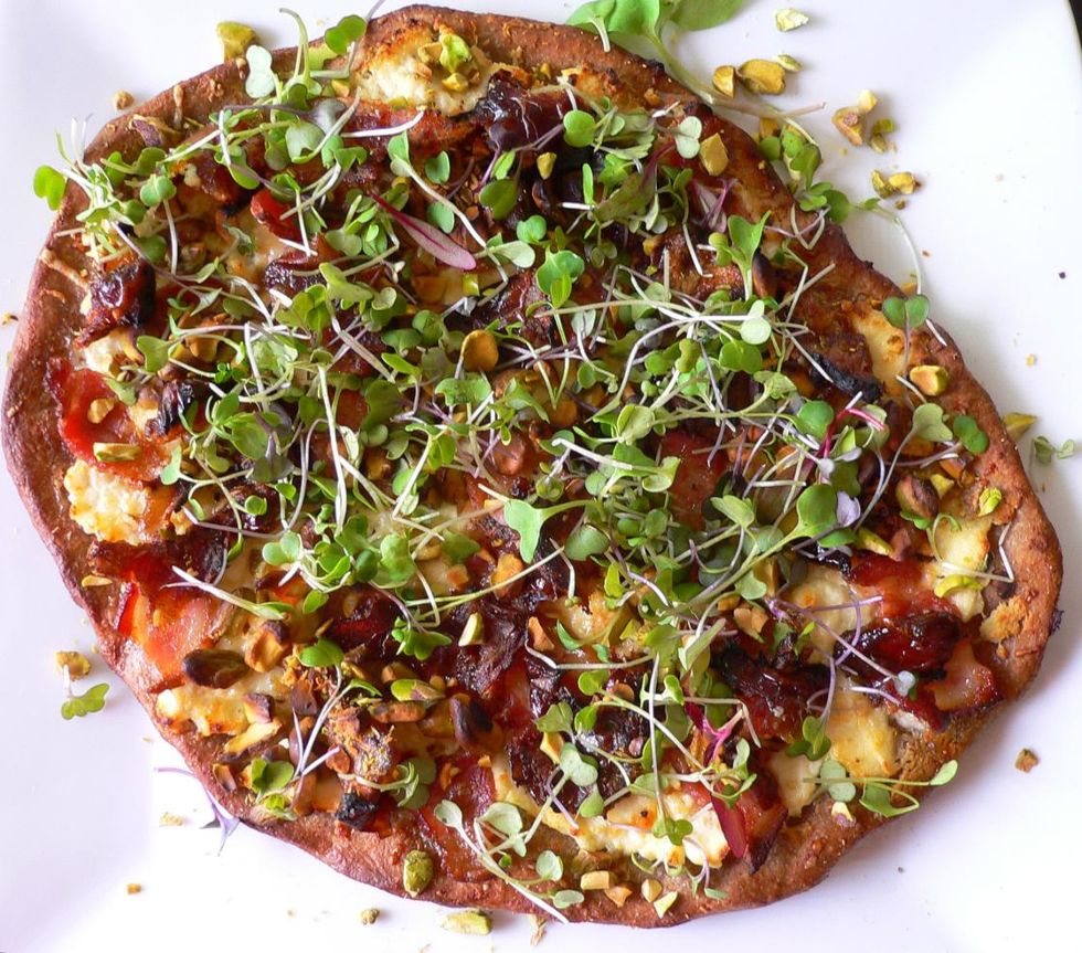 rainbow pizza with honey and micro greens