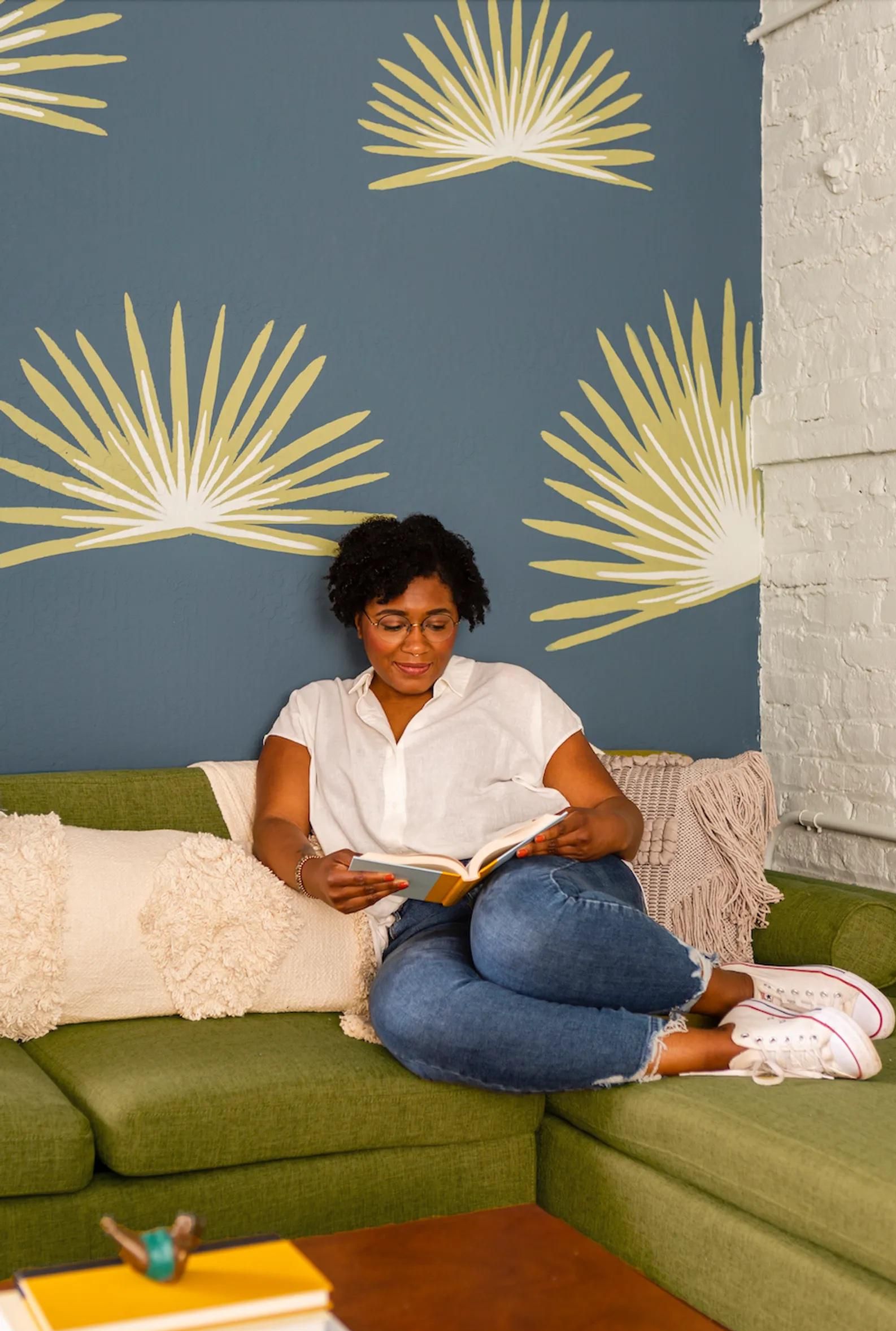 reading a book on the couch