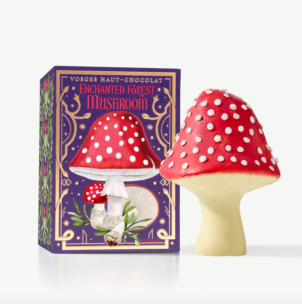 Red and white mushroom-shaped chocolate with decorative box.