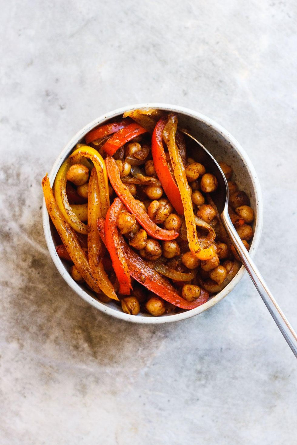 red and yellow peppers with spices and chickpeas