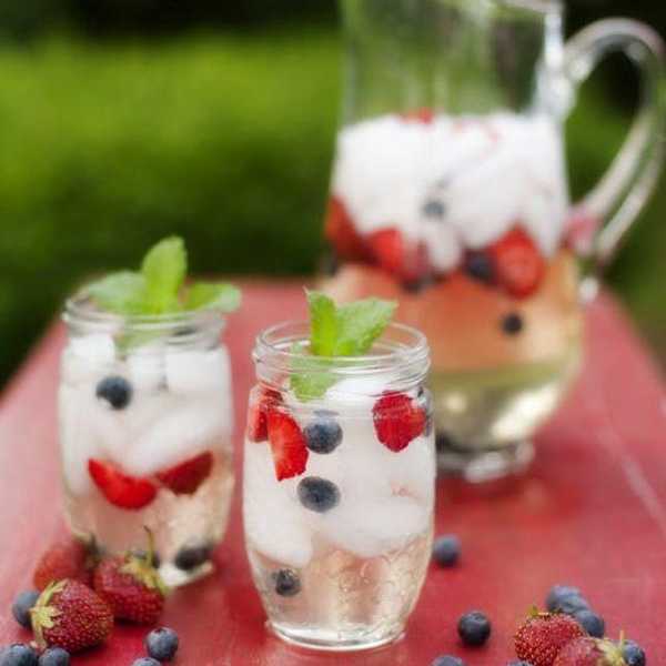 red white and blue cocktail with berries