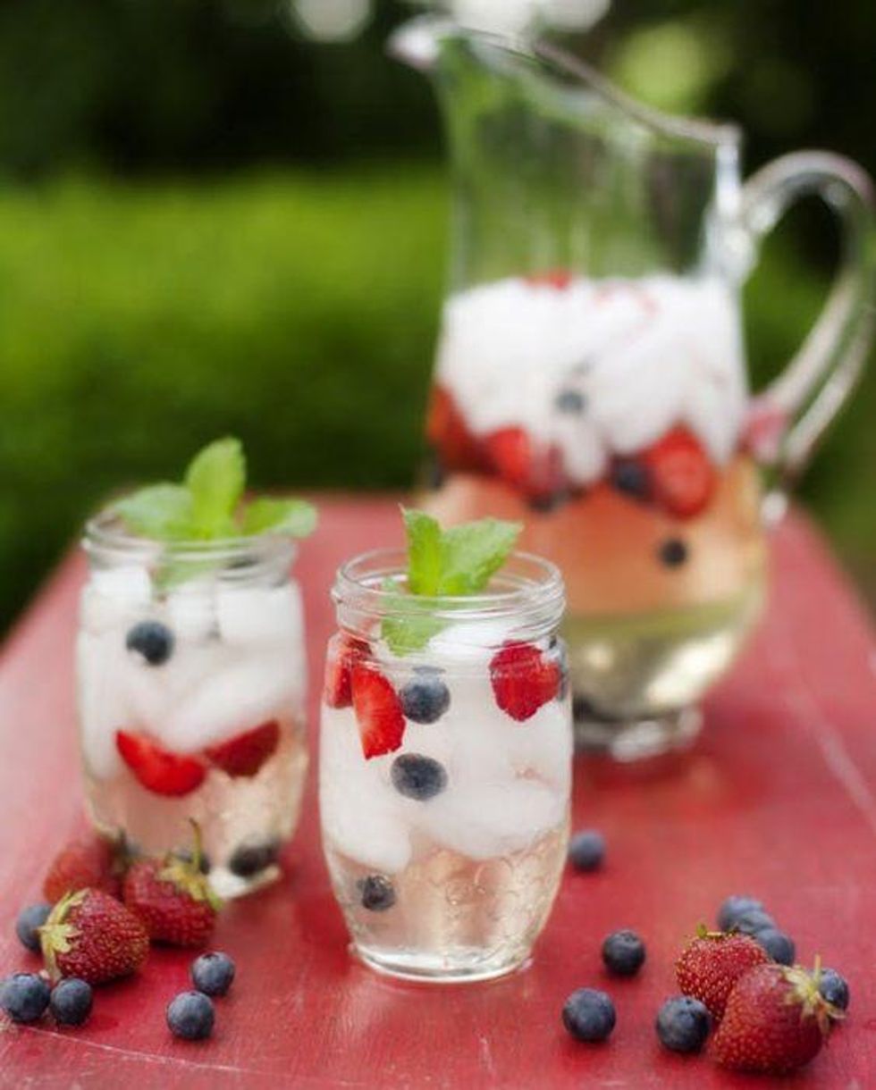 red white and blue cocktail with berries
