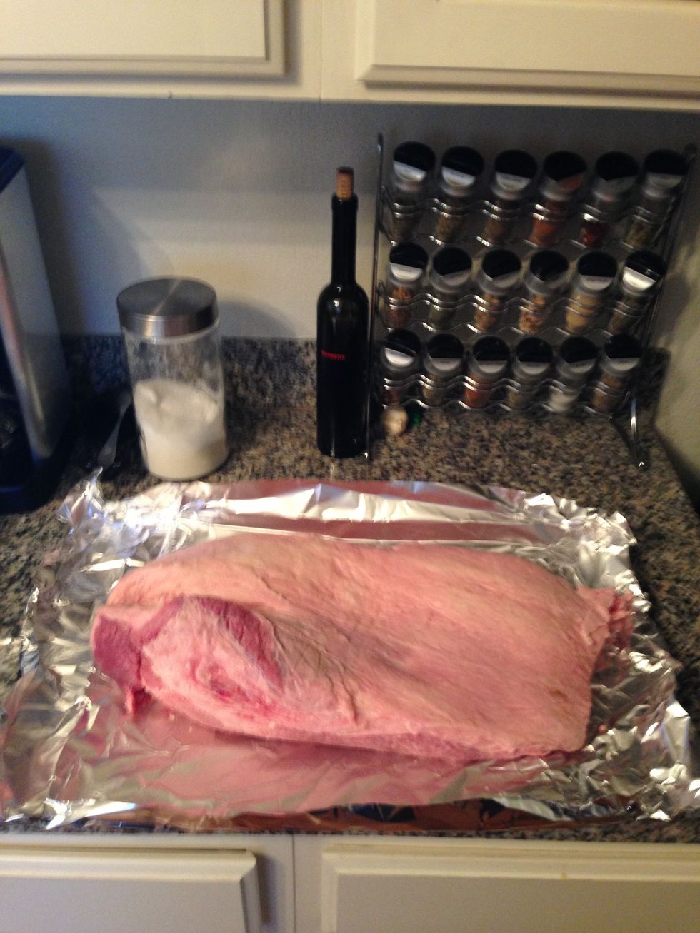 Rinse the brisket in cold water until the water that runs off of it is clear. Pat dry with heavy paper towels. Making a workstation out of heavy duty tin foil will save lots of cleanup.
