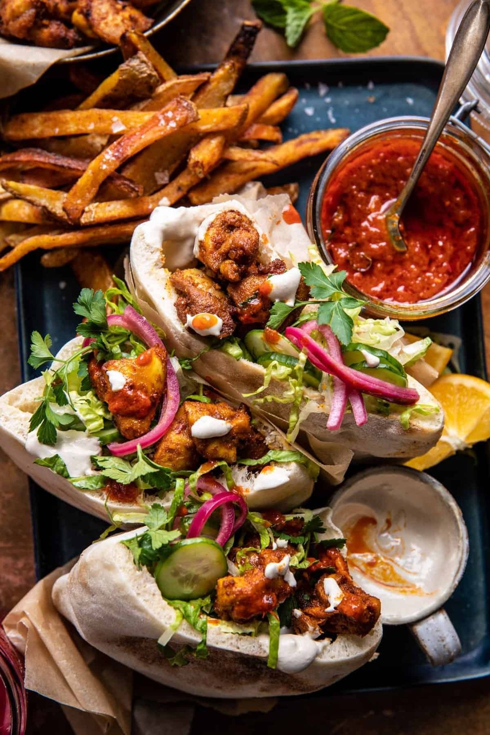 Roasted Turmeric Chicken Pitas with Garlic Lemon Tahini