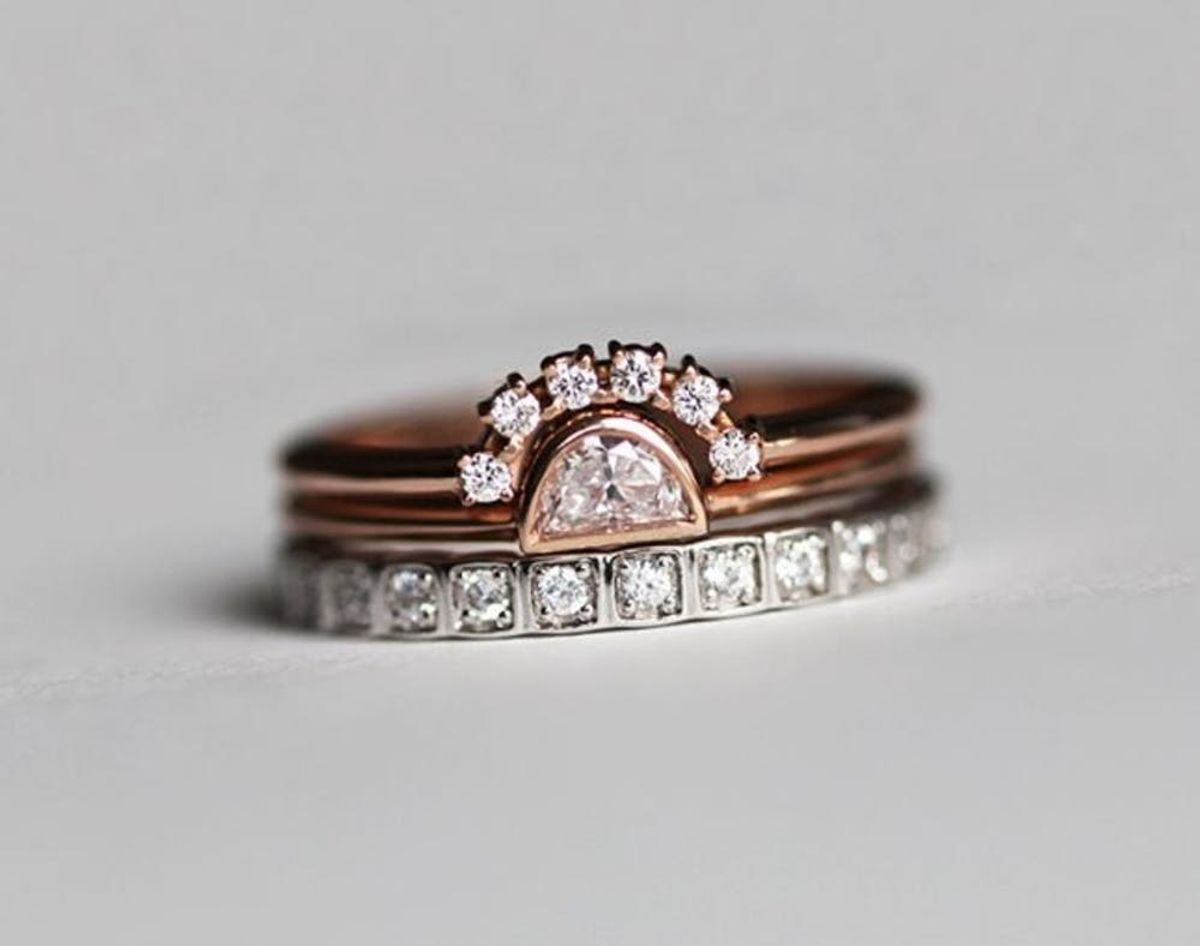 Rose gold Etsy engagement ring with rows of diamonds