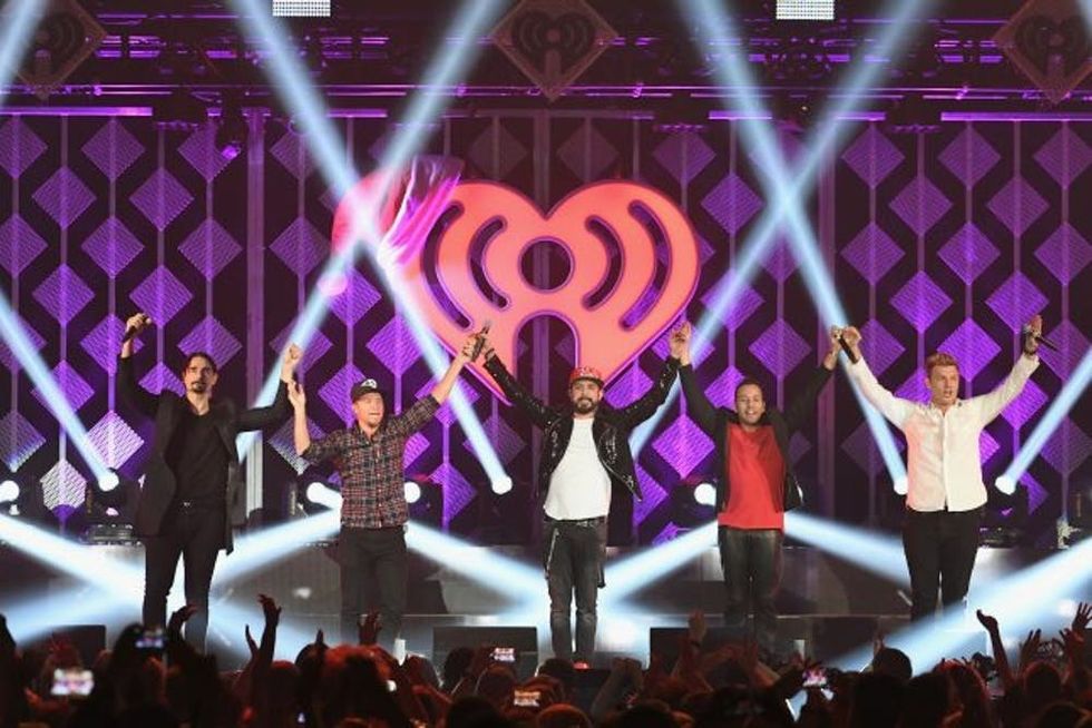ROSEMONT, IL - DECEMBER 14: (L-R) Kevin Richardson, Brian Littrell, A.J. McLean, Howie Dorough, and Nick Carter of Backstreet Boys perform onstage during 103.5 KISS FM's Jingle Ball 2016 at Allstate Arena on December 14, 2016 in Rosemont, Illinois. (Photo by Daniel Boczarski/Getty Images for iHeart)