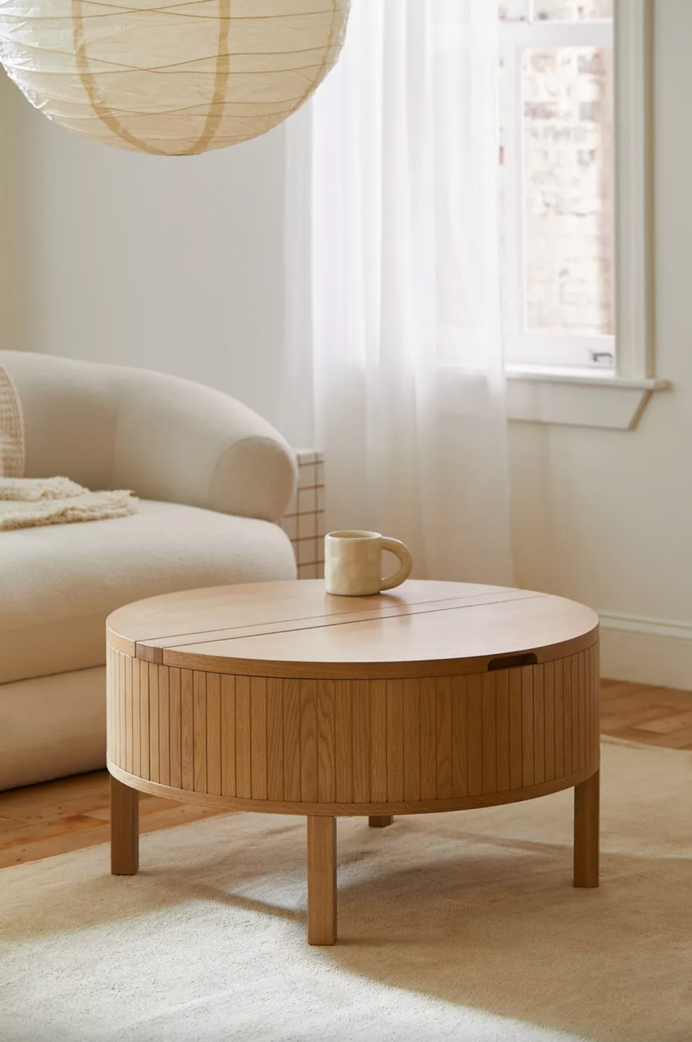 round wood coffee table with storage