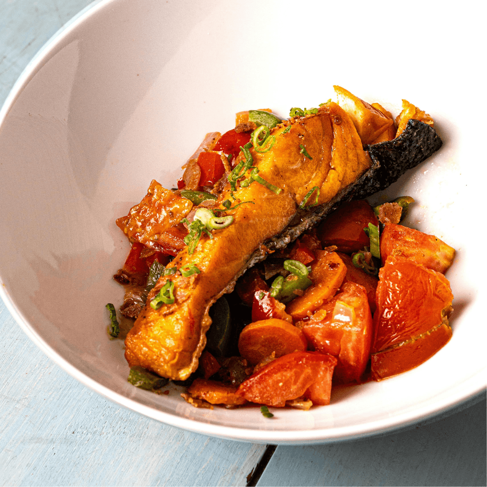 Salmon dish in a white bowl